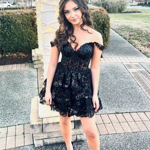 Worn once a month ago. This seasons Sherri Hill very hard to find dress